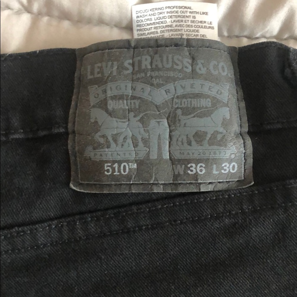Levi’s 510 ripped knee jeans